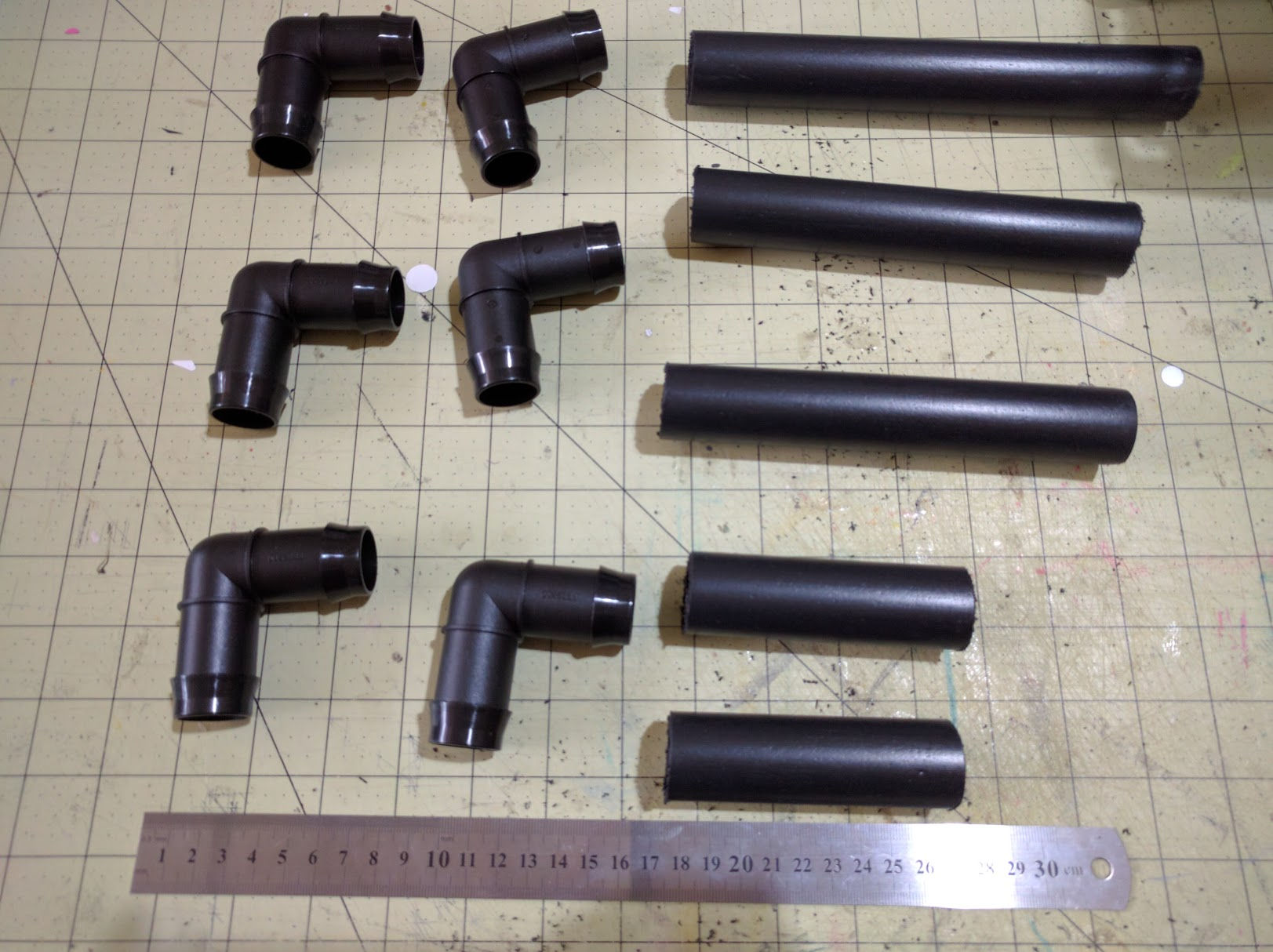 Lengths of pipe cut to size
